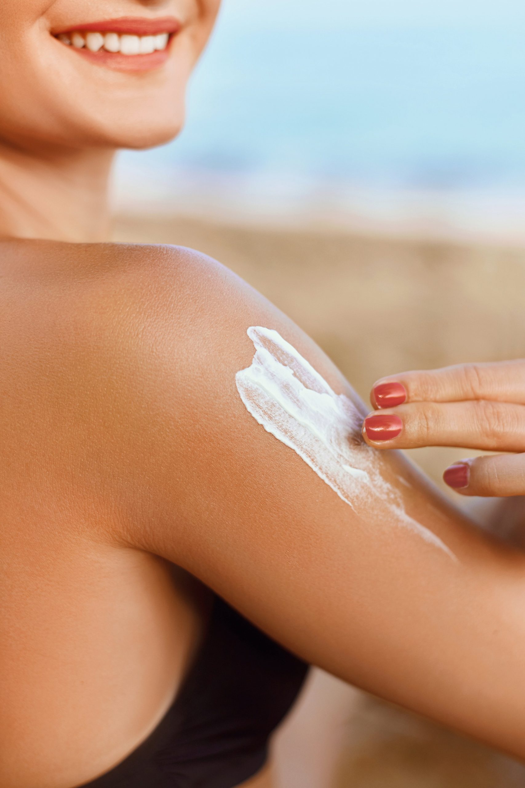 Woman,In,Bikini,Applying,Sunscreen,Solar,On,Tanned,Shoulder.,Sun